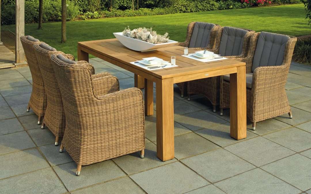 Outdoor table and chairs look great with a well manicured lawn