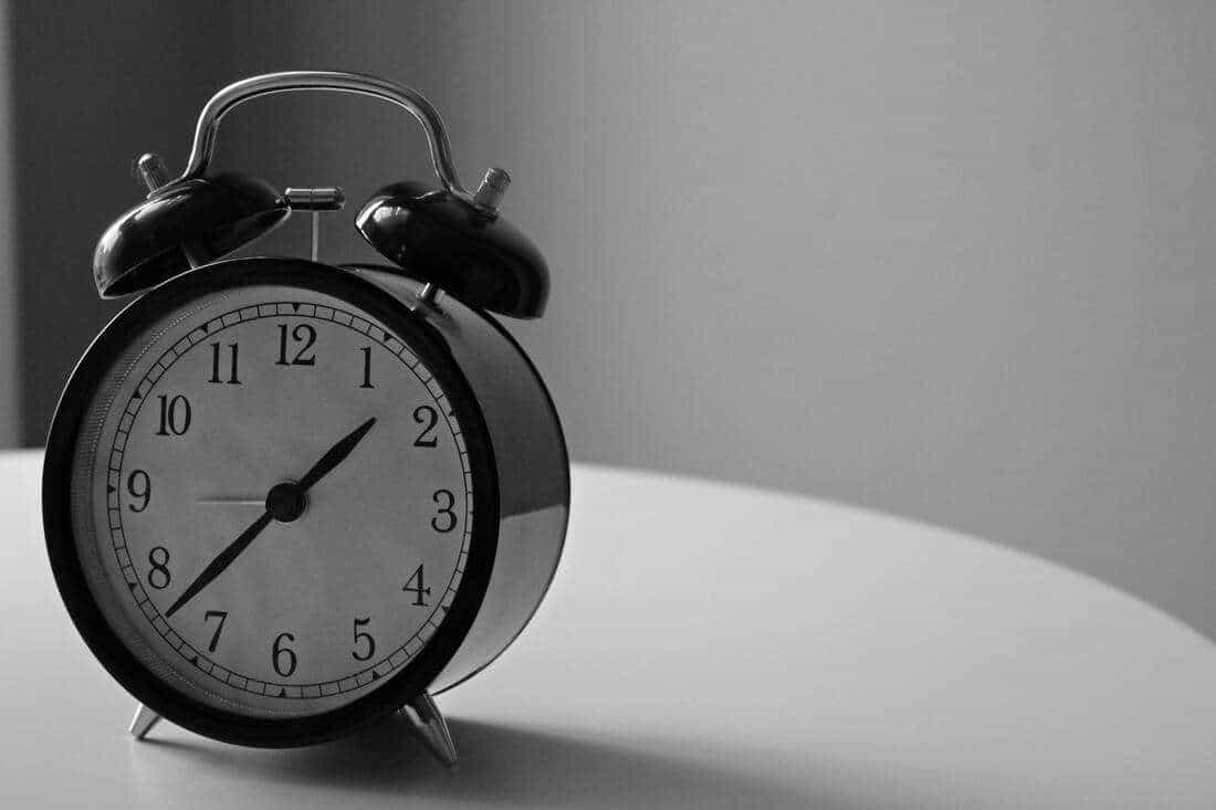 A clock sitting on a table